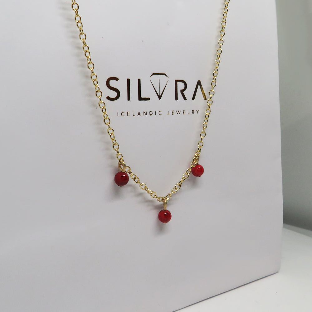 Red stone gold necklace