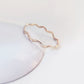 Delicate gold wave ring